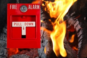 fire alarm with fire background